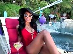 Amazing ebony girl Anya Ivy is hanging out by the pool.